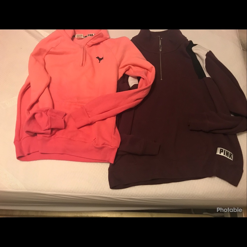 Two PINK half zip sweaters